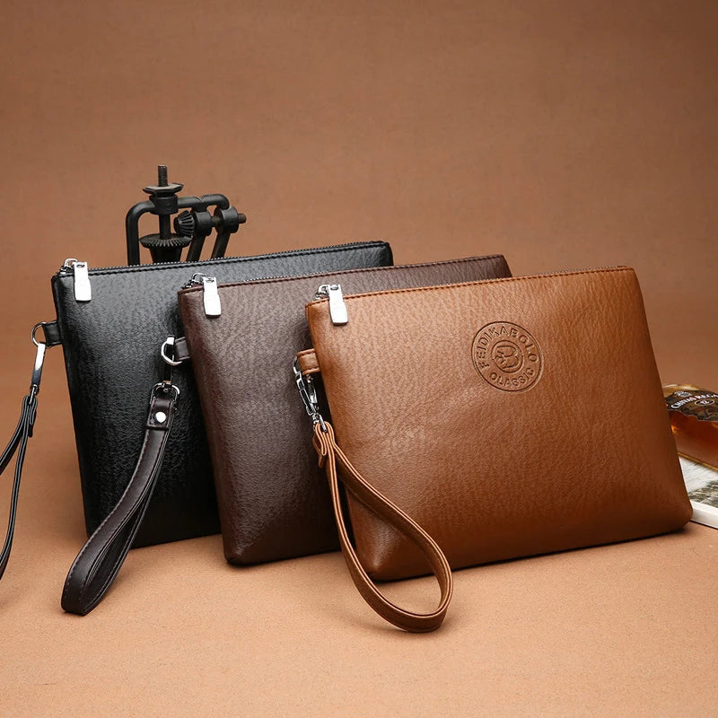 Pochette homme business Style Noir A / 24 x 18 x 2cm-Marron A / 24 x 18 x 2cm-Marron B / 24 x 18 x 2cm-Marron C / 24 x 18 x 2cm-Noir B / 24 x 18 x 2cm-Marron D / 24 x 18 x 2cm-Noir C / 24 x 18 x 2cm-ShopGET® 